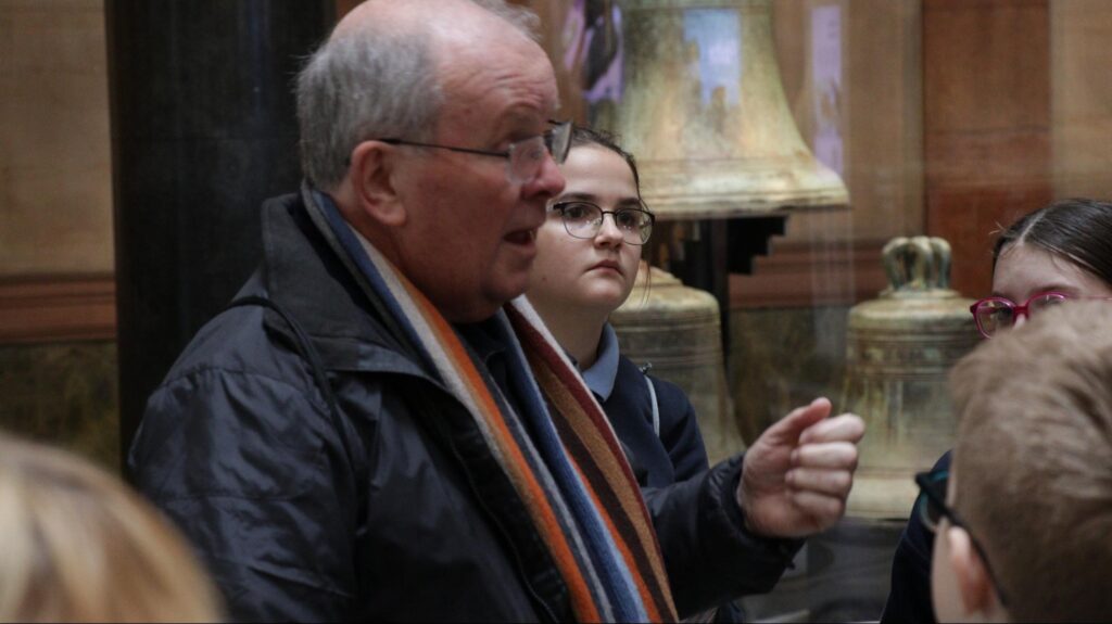Photograph of Eugene Dunbar sharing stories with the children in the Museum (Stephen Crilly -Tóchar Stories).