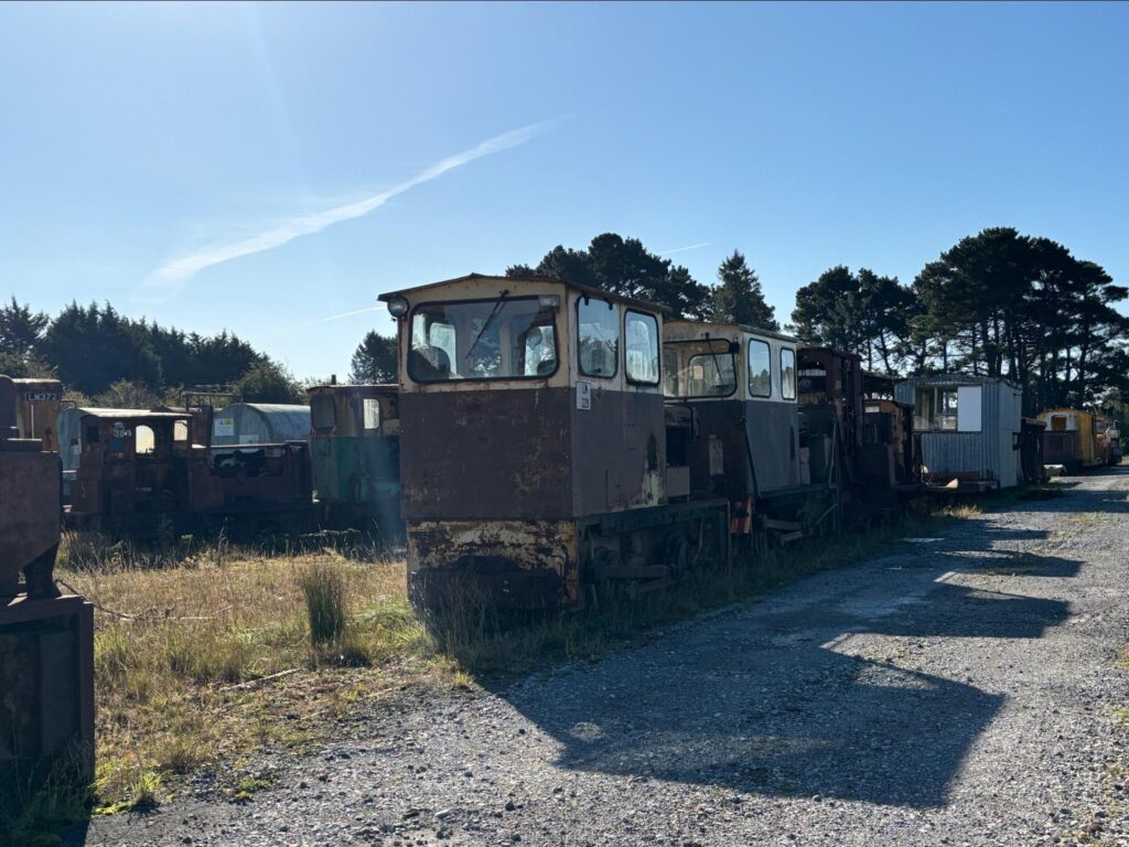 Photograph of rusting machinery and vehicles at the former Bord na Mona workshop near Lough Boora