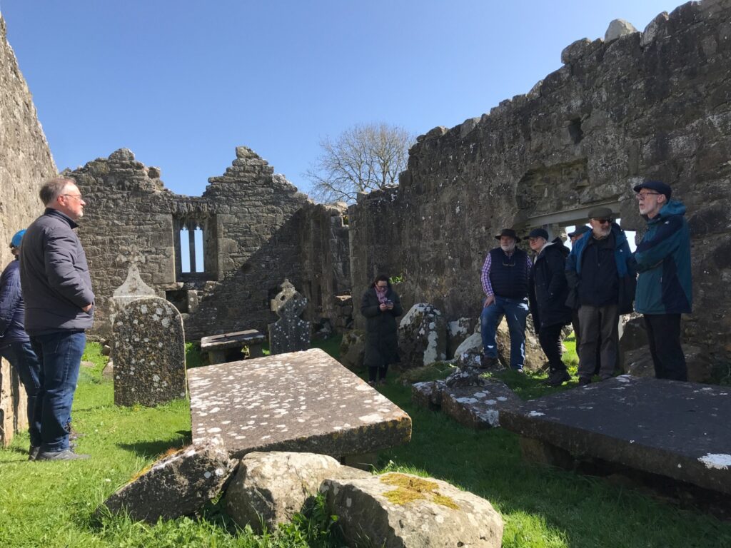 Photograph Séamus Corcoran of the Lemanaghan Bog Heritage and Conservation Group guiding people at St Manchan’s Church at the ancient monastic site, Co Offaly not far from where 1.000 year old remains were uncovered