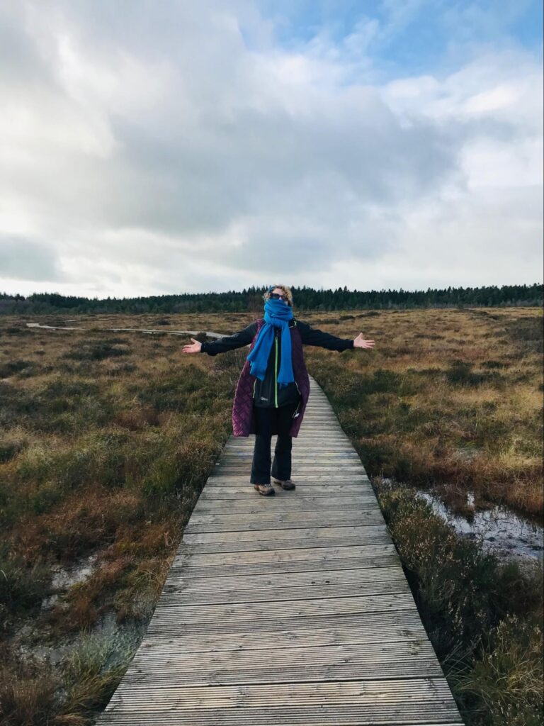 Photograph of Artist Annie Holland on Abbeyleix Bog Project, November 2024 (Credit Helen Shaw)