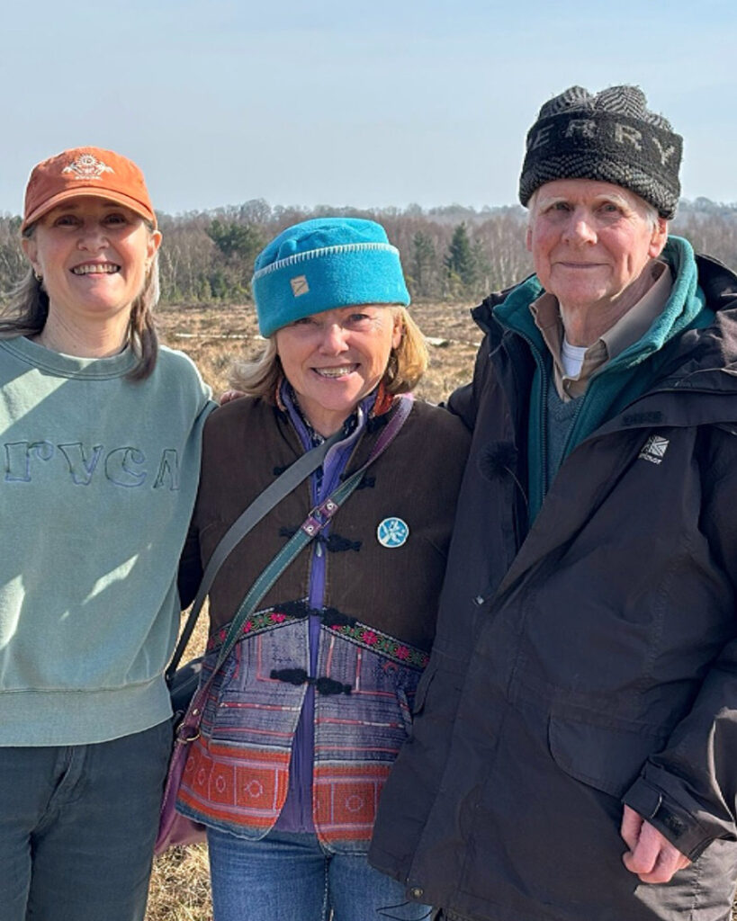 Local macro photographer Melissa Casey, Helen Shaw and Hugh Shepherd at the high bog on the boardwalk, Abbeyleix Bog dressed in winter hats and jackets.