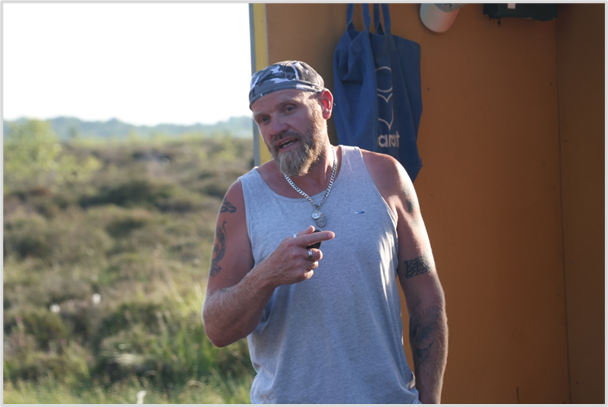 Man standing and speaking